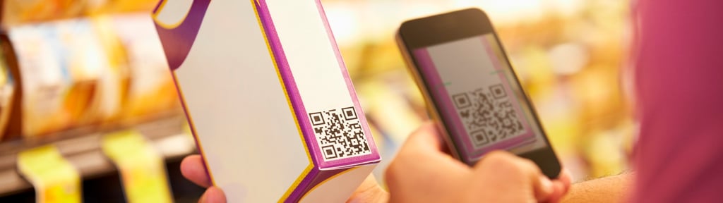 Consumer scanning QR code using smartphone