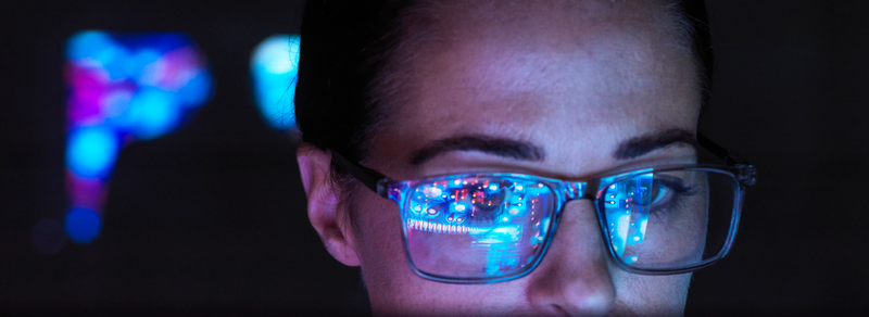 Close-up of a woman's face wearing glasses