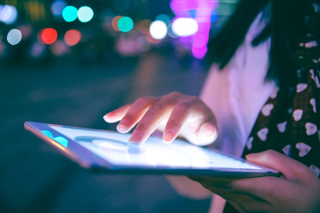 Image of person working on a tablet