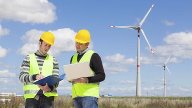 Engineers in wind farm