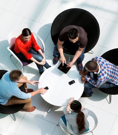 People sitting around a table and having a discussion