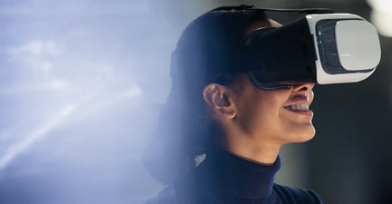 Businesswoman using virtual reality simulator